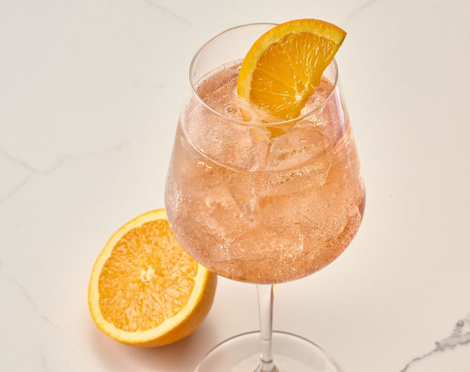Ruth's Chris CHEF’S Summer Cocktail Selection: CHANDON SPRITZ, 130 cal a blend of CHANDON sparkling wine and a refreshing liqueur of spices and orange peels
