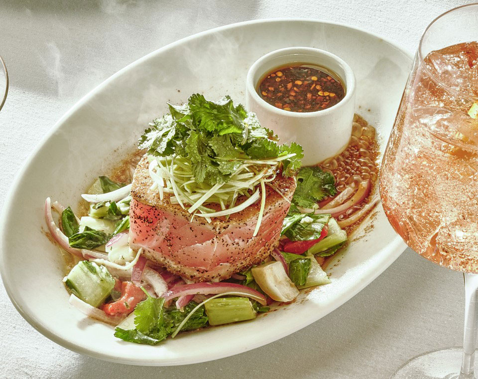 Ruth's Chris CHEF’S Summer Selection: AHI TUNA MIGNON, an 8 oz seared ahi tuna fillet, lightly seasoned and topped with a house-made soy-ginger sauce