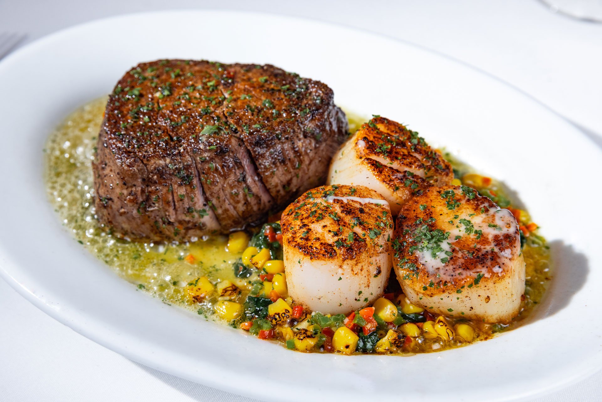 Ruth's Chris Chef’s Winter Selections, featuring Filet & Scallops. Enjoy with a seasonal cocktail and finish with a warm Chocolate Molten Lava Cake.