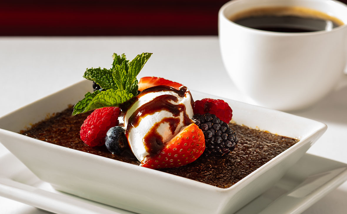 Ruth's Chris DDark Chocolate Creme Brulee. Silky custard infused with rich dark chocolate, topped with a crisp caramelized sugar finish.
